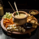 bamboo skewers charcuterie board cheese celery bread sauce vegetables