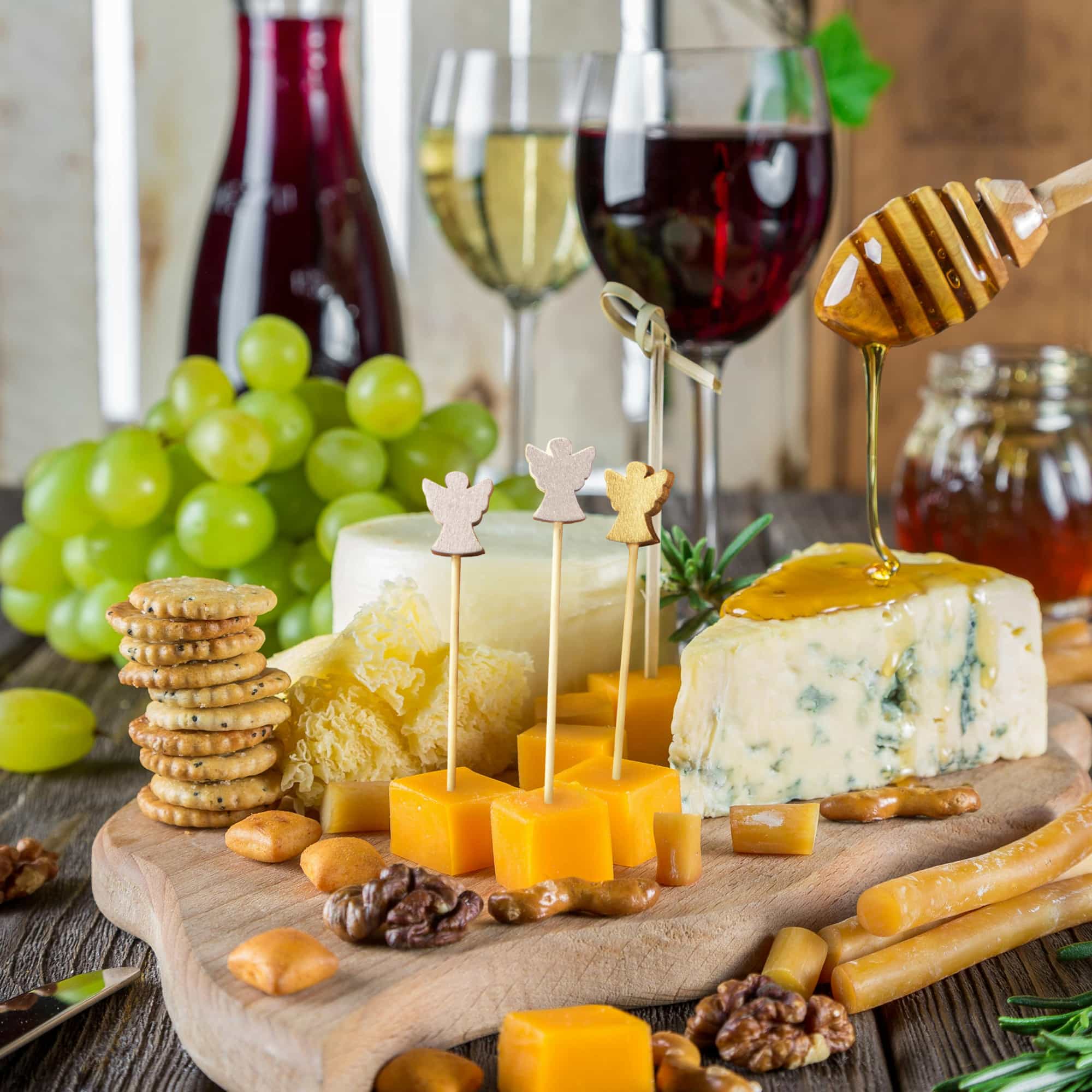 holiday angel picks skewers food drink gold silver garnish charcuterie cheese crackers red wine honey bamboo nuts walnuts