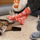 Red tie dye socks worn