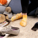 Person wearing tie dye socks
