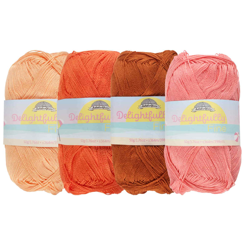 group of 4 yarn side by side of likewise colors (orange) 
