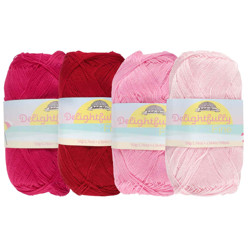 group of 4 yarn side by side of likewise colors (red) 