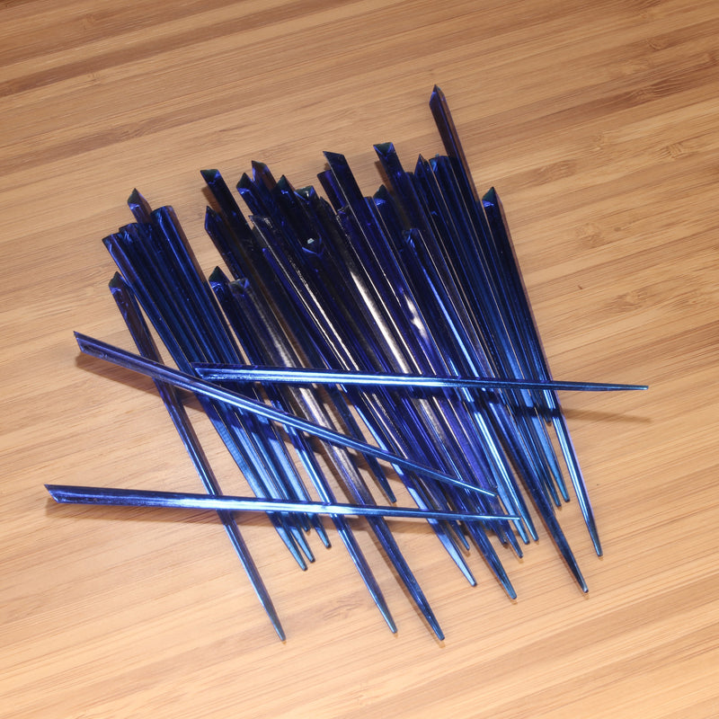 4.5" dark blue prism plastic skewer picks on bamboo wood