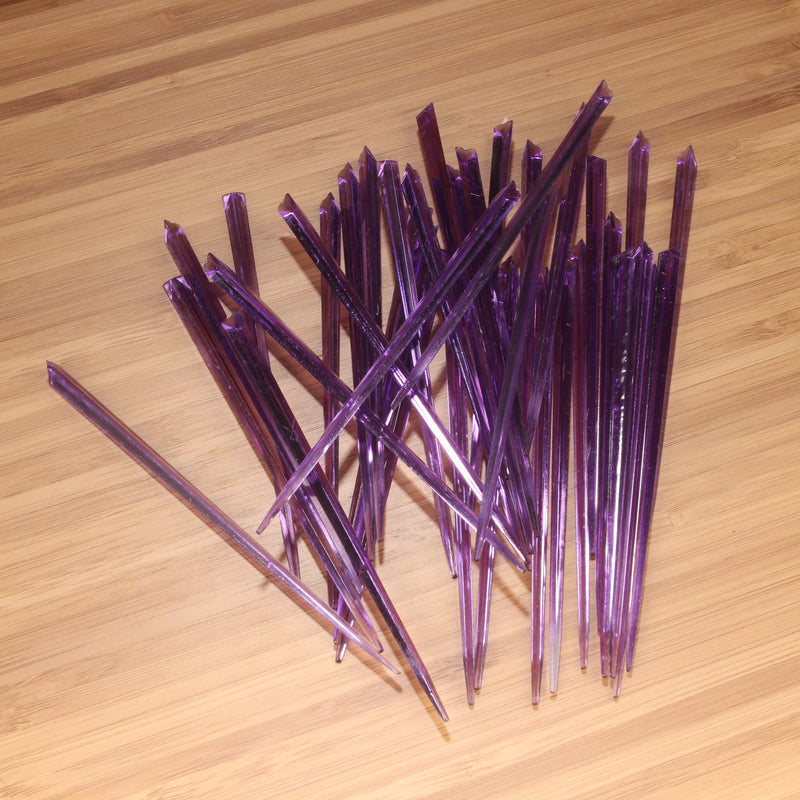 4.5" purple prism plastic skewer picks on bamboo wood