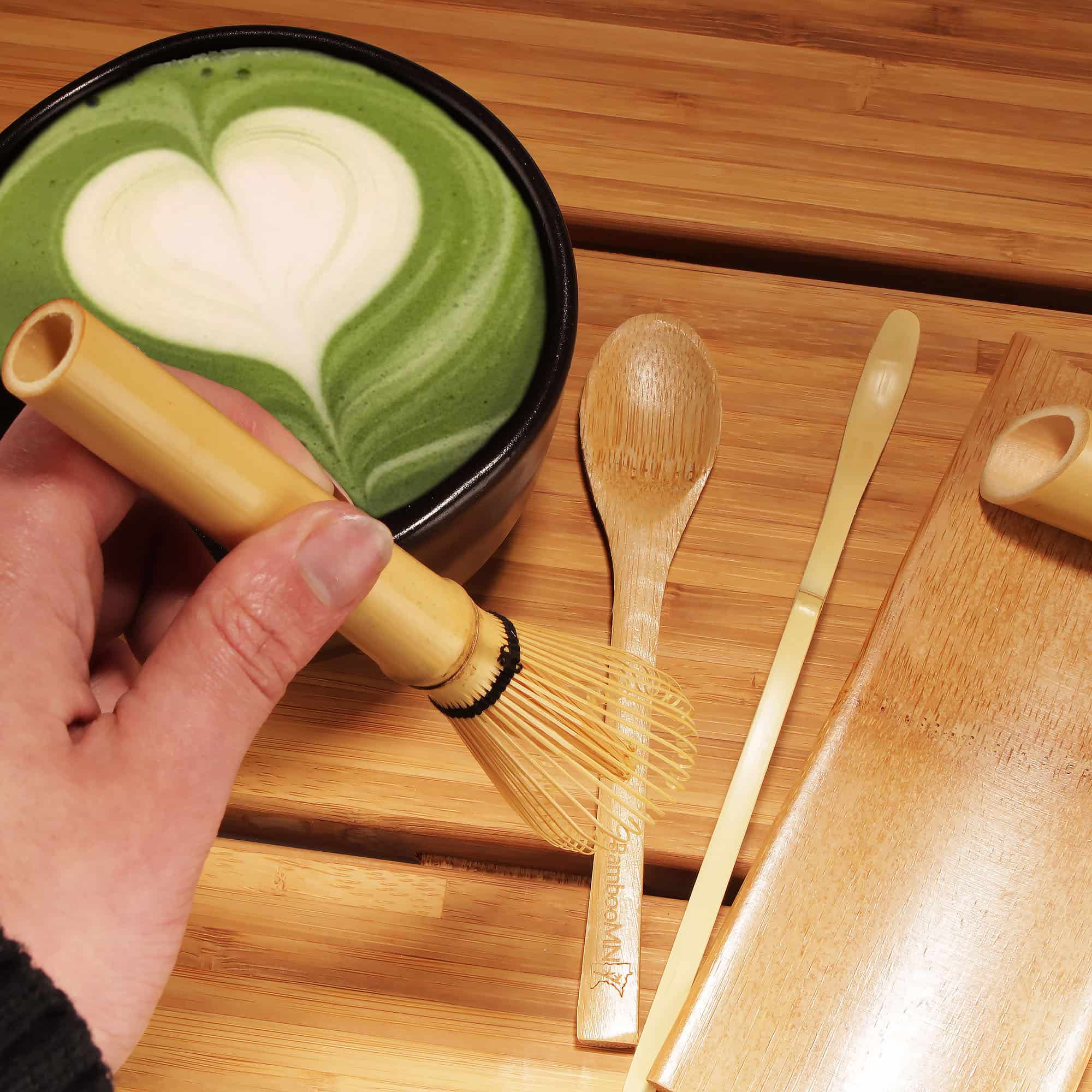 skinny golden tea whisk making matcha