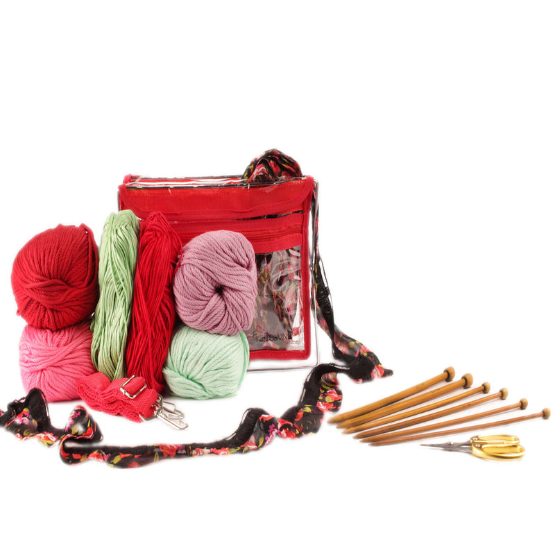Red tote bag filled with yarns and supploes