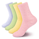 assortment of fuzzy socks in pastel pink, yellow, green and blue