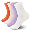 assortment of fuzzy socks in orange, off white, lavender purple and white