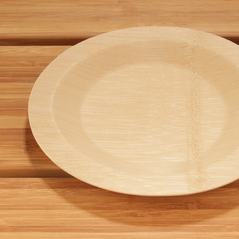 bamboo veneer round appetizer food plate top closeup