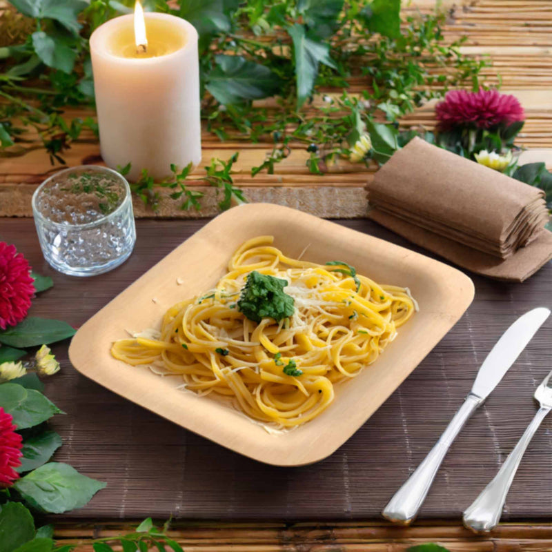 bamboo veneer plate food pasta table placemat utensils candle napkin