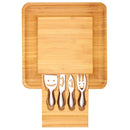 Charcuterie board with utensils top down view showing flat surface in the middle and space for crackers