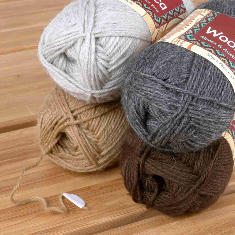 Soft merino wool, alpaca, and nylon yarn skeins in vibrant colors, perfect for knitting and crocheting