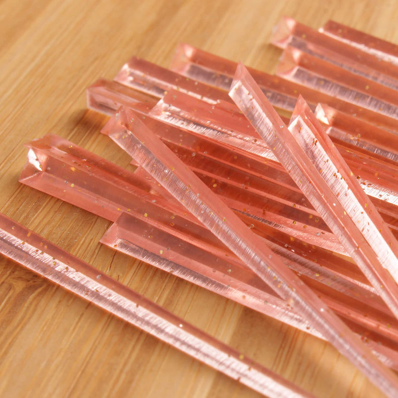 3.5" pink with gold glitter prism plastic skewer picks on bamboo wood