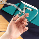 Embroidery Scissors with Decorative Srollwork Motif Handles In Hand
