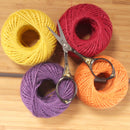 Embroidery Scissors with Decorative Sun Motif Handles Spool of Thread