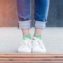 Person wearing tie dye socks