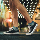 Person wearing tie dye socks