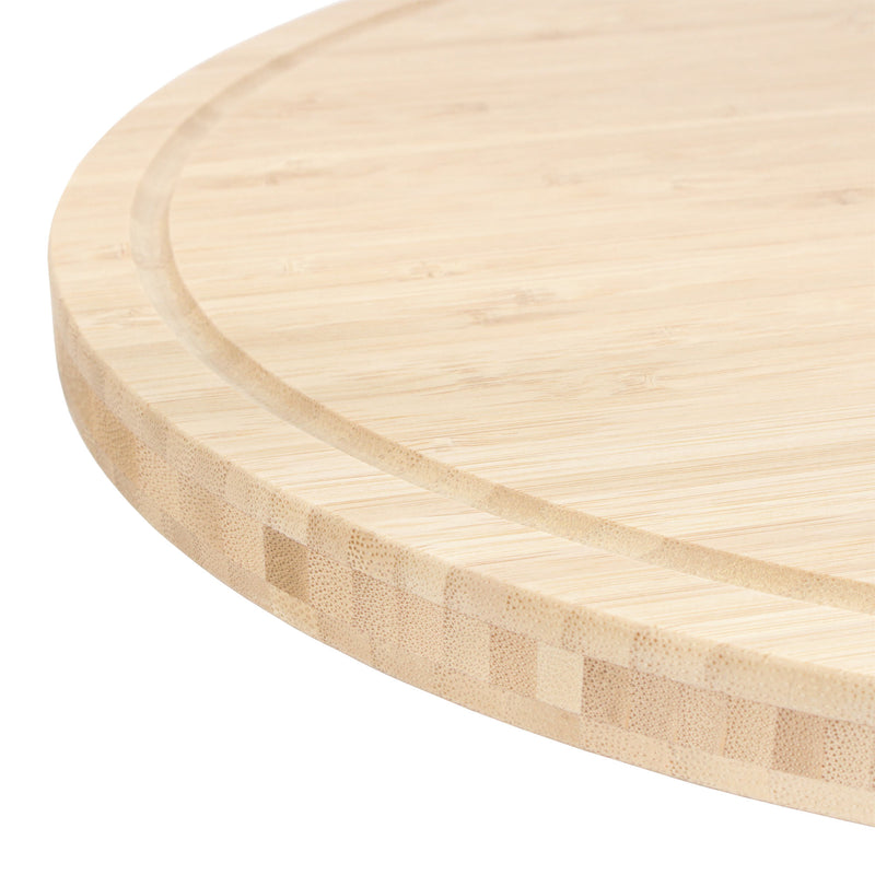 bamboo grooved oval cutting and serving board close up on grooved edge