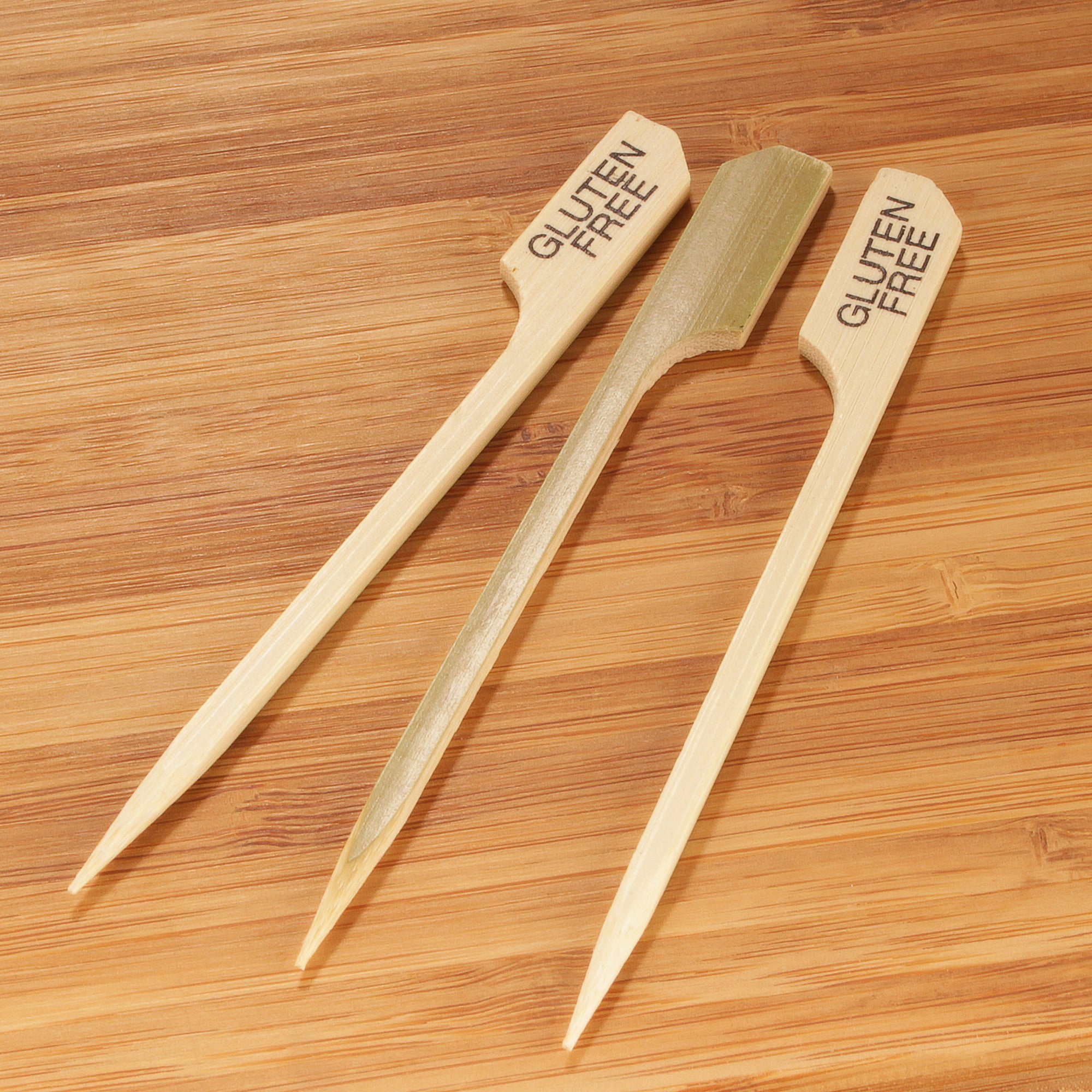 gluten free label bamboo paddle picks cutting board