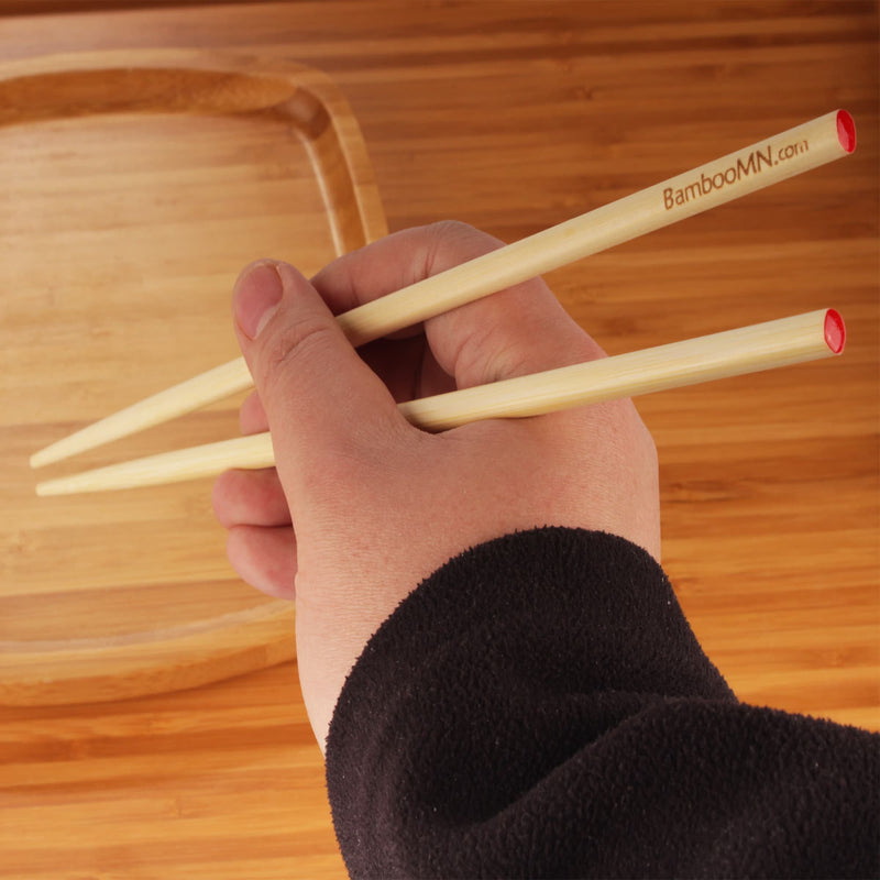 red dot bamboo chopsticks lifestyle in hand