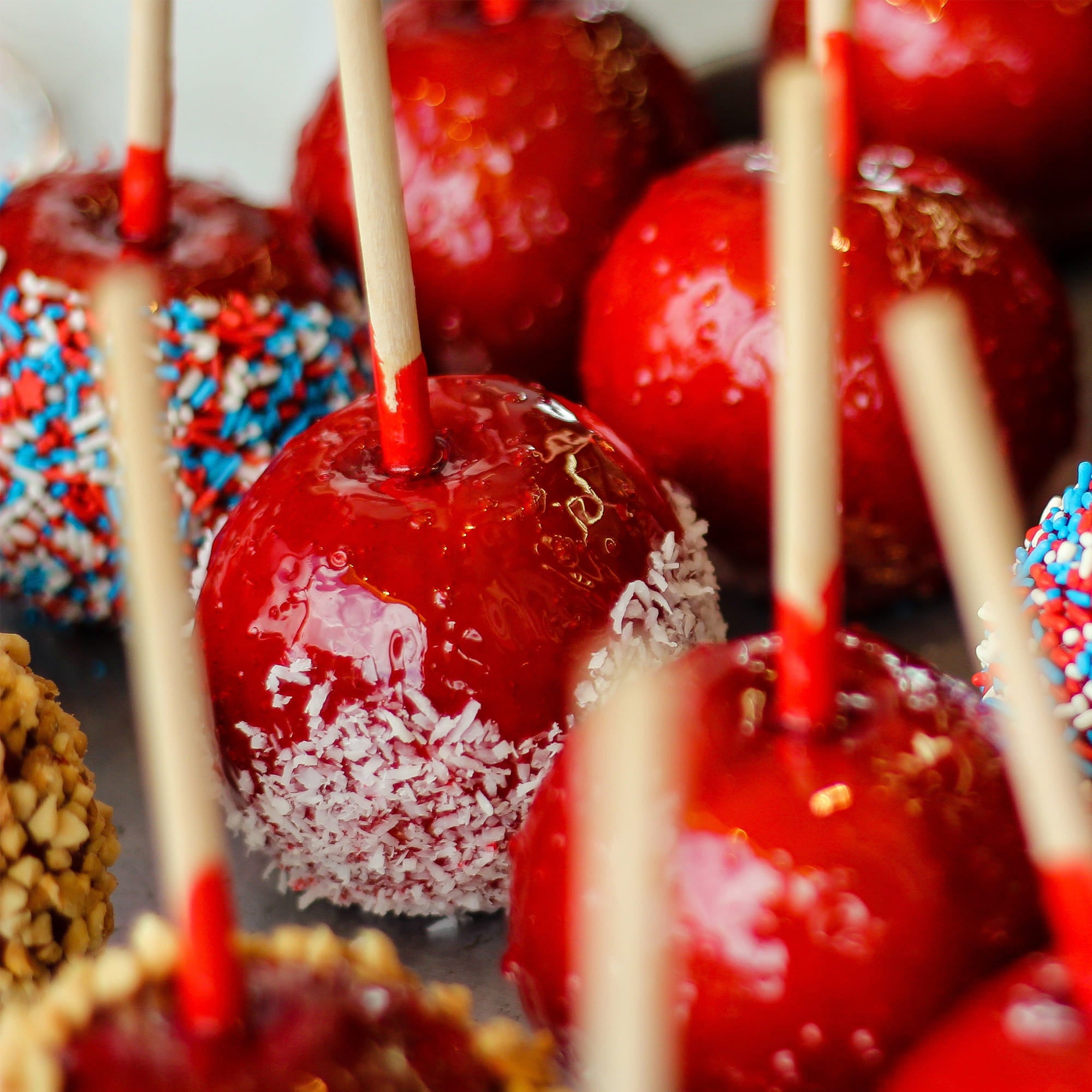 bamboo food skewer red candy apple sprinkles crushed nuts