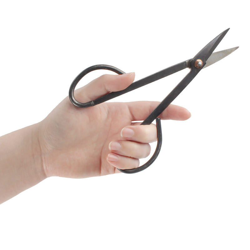 black bonsi trimming shear tool in hand