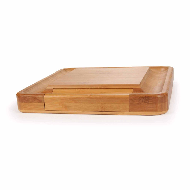 Charcuterie board laid flat and folded inwards for utensil storage