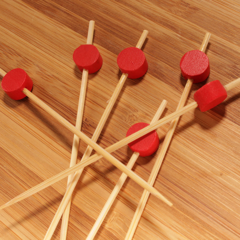 red circle picks on bamboo board