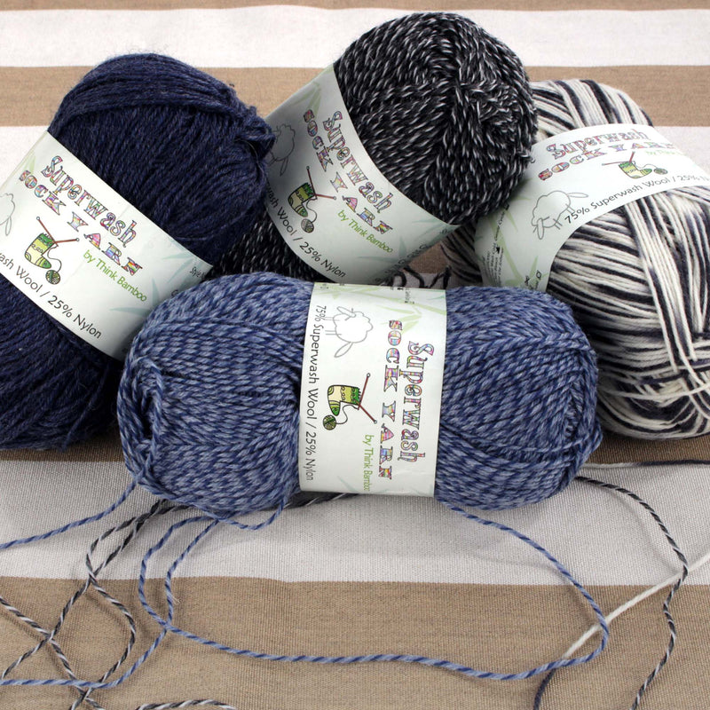 group of four yarn on ground