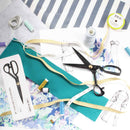 dress design with fabric scissors