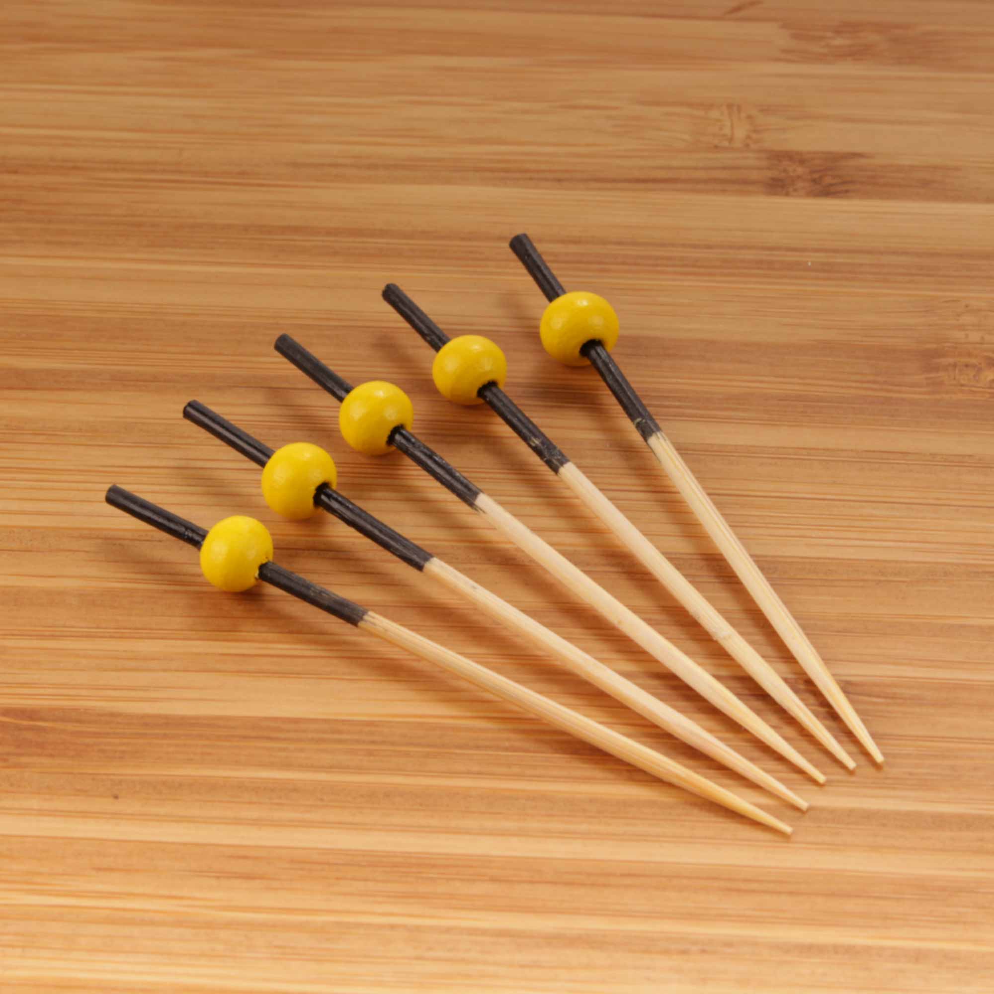 small bamboo ball picks yellow tops