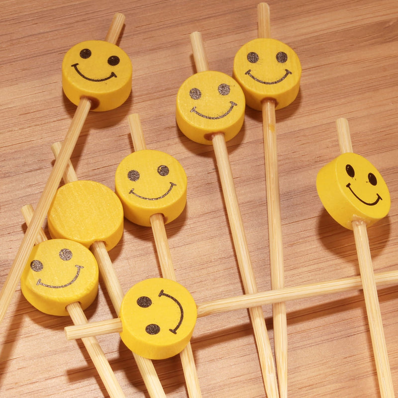 smiley face yellow smile bamboo picks closeup