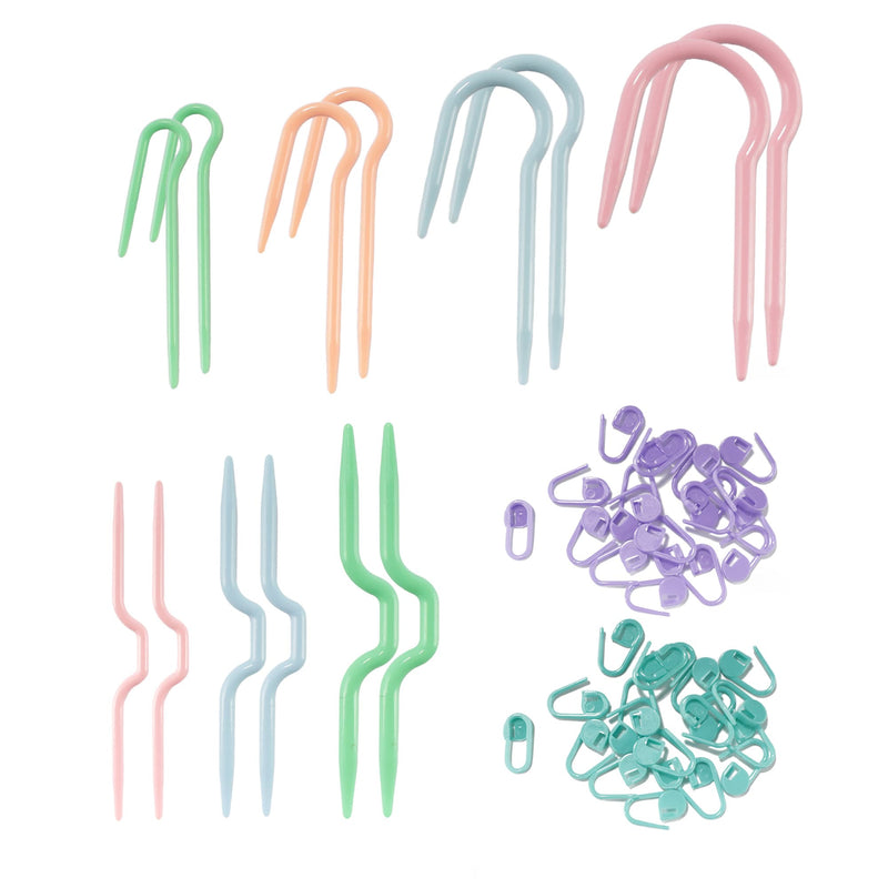 group of cable needles and stitch markers